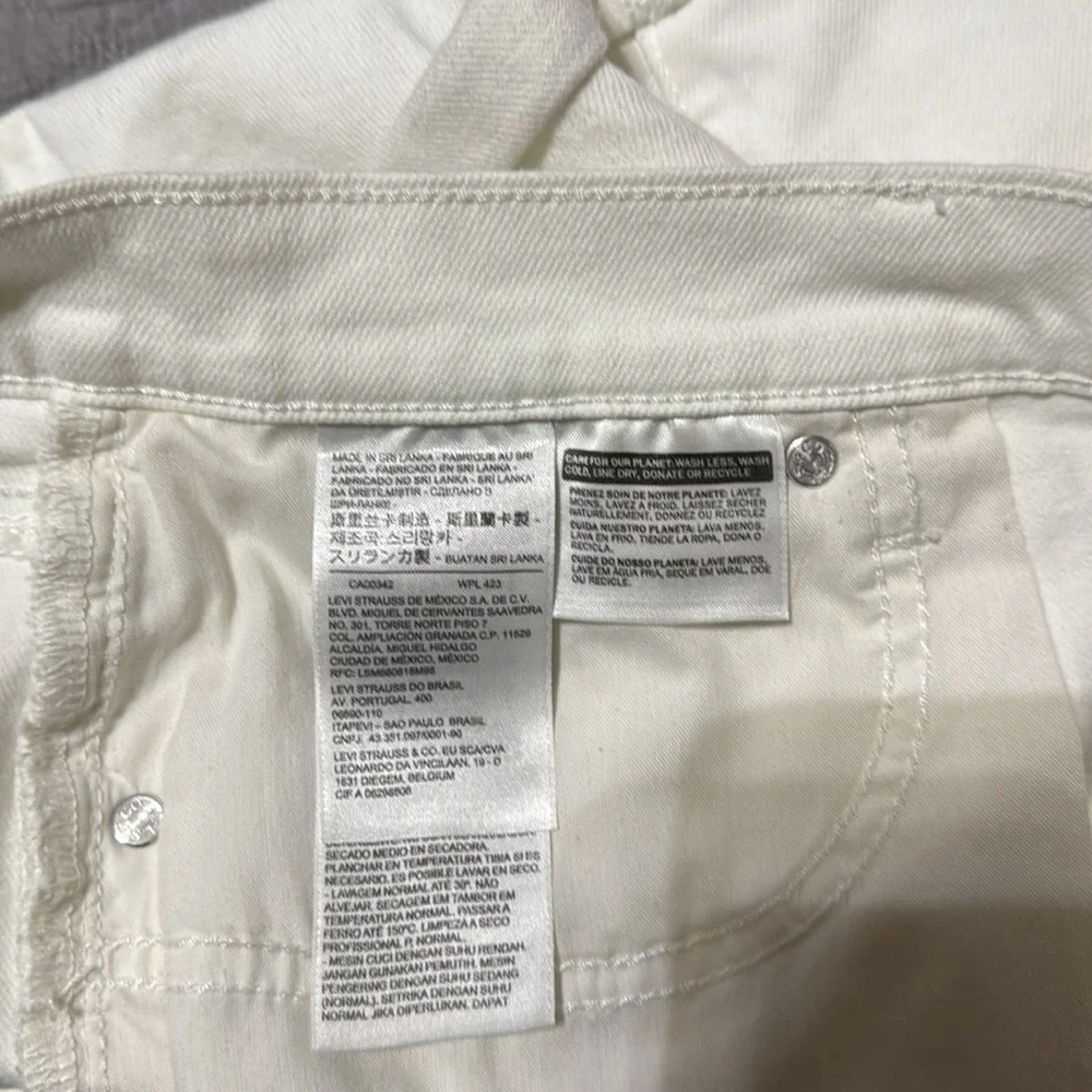 Levi's Mid Rise Mid Length Denim Shorts Women's Size 31 - Picture 12 of 13